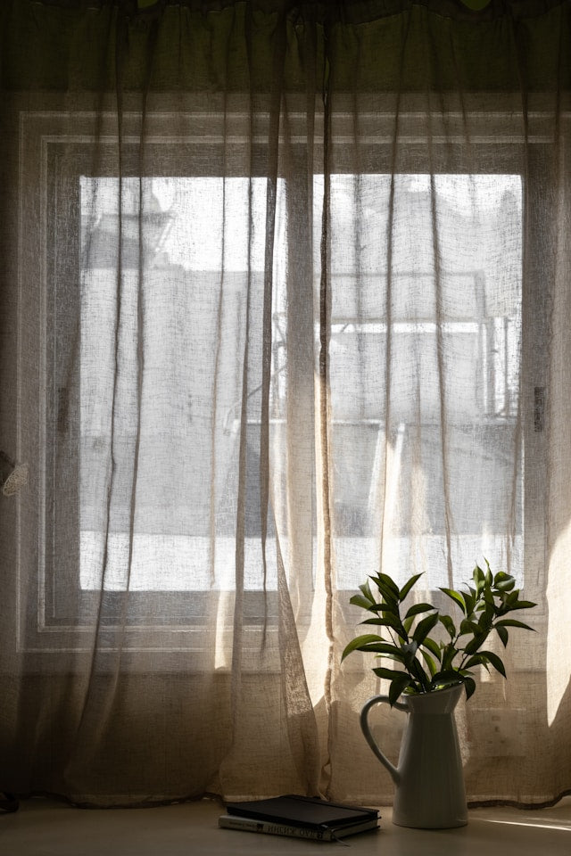 How to Style Extra-Long Curtains Without Letting Fabric Pool Too Heavily