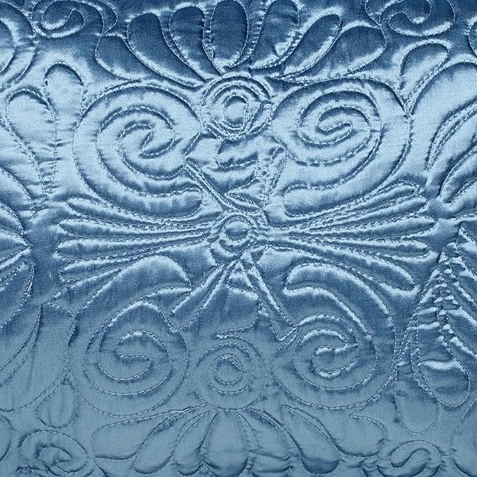 Touch of Class Portia Luxury Bedding | Sapphire Blue | Quilted Polyester Satin | Hand Guided Machine Quilted Scroll Design 7 Piece Set: Cal King Oversized Bedspread, 2 King Shams, 4 Pillows